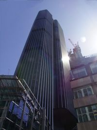 Low angle view of modern building against sky