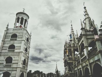 Low angle view of cathedral against cloudy sky