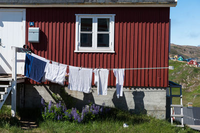 Clothes drying outside house