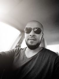 Portrait of young man wearing sunglasses