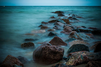 Scenic view of sea against clear sky