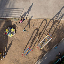 High angle view of people on road