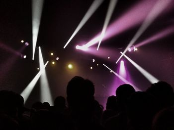 People enjoying at concert