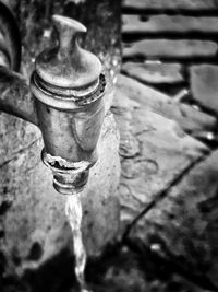 Close-up of water faucet