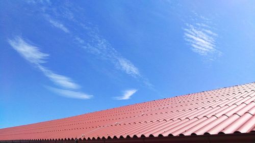 Low angle view of building against blue sky