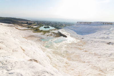 Scenic view of beach against clear sky
