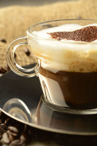 Close-up of coffee cup on table