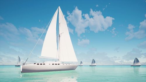 Sailboat sailing in sea against sky