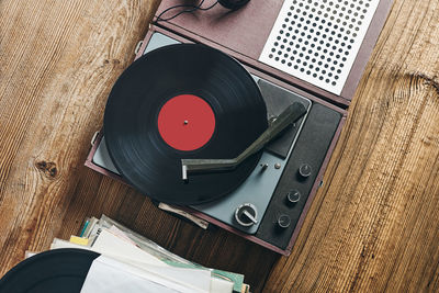 Listening to music from vinyl record. playing music from analog disk on turntable player. stereo set