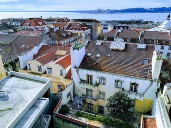 High angle view of residential buildings against sky