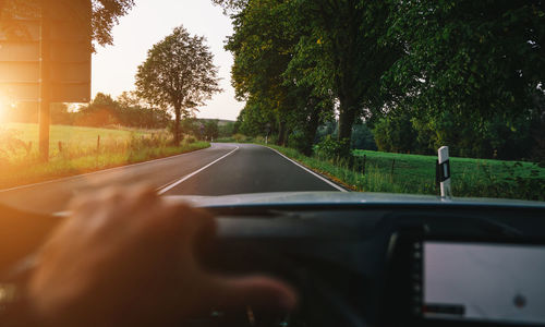 Road seen through car windshield