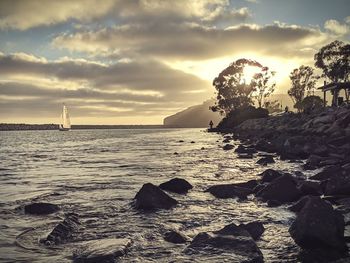 Scenic view of sea against sky during sunset