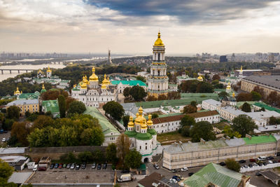 High angle view of buildings in city against sky