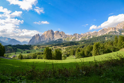 Scenic view of landscape and mountains against sky