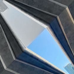 Low angle view of skylight in building