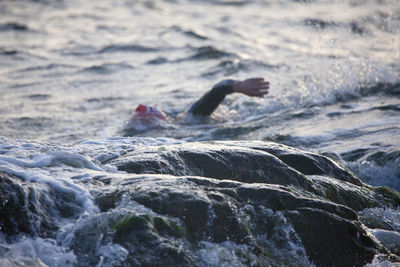 Person swimming in river