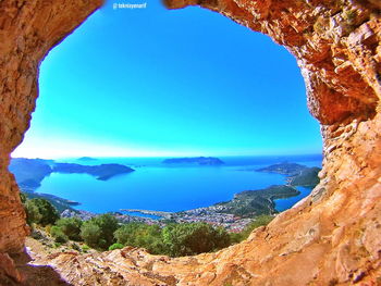 Scenic view of sea against clear blue sky