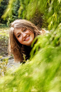 Portrait of smiling girl in sunlight