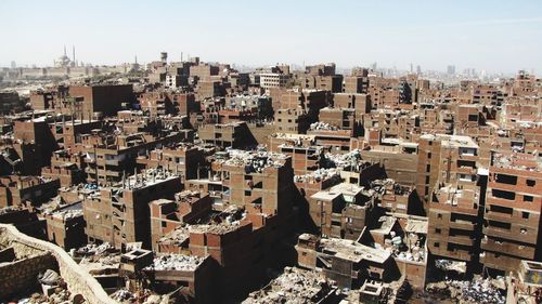 Aerial view of cityscape against sky