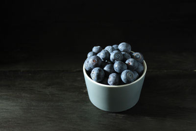 Close-up of blueberries on table