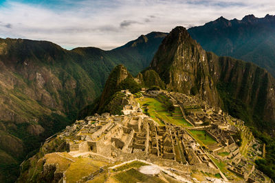 Aerial view of ancient architecture against rock mountains