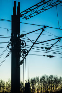 Low angle view of electricity pylon