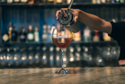 Man holding glass of wine