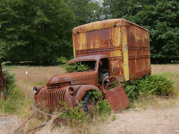 Abandoned truck on field