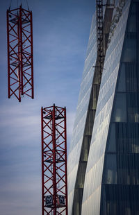 Low angle view of metal structure against sky