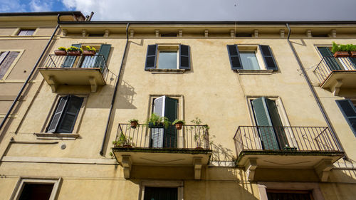 Low angle view of residential building against sky