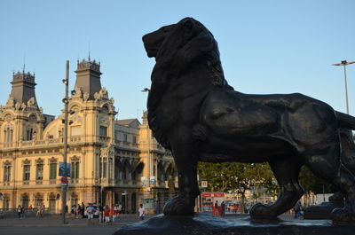 Statue of city against clear sky