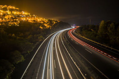 Traffic on road at night