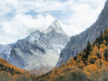 Scenic view of mountains against sky during autumn