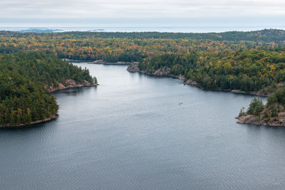 Scenic view of river against sky