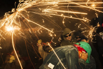 Firework display at night