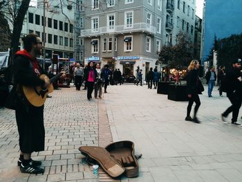 People walking on city street