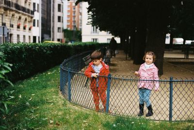 Full length of woman standing on grass