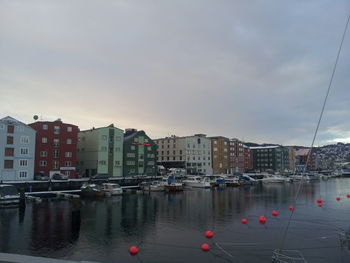 Buildings in city against sky