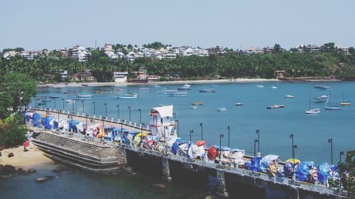 High angle view of boats moored at harbor