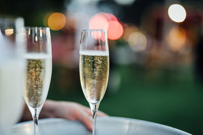 Luxury wine and champagne  for fine dining with and glassware, beautiful blurred  background. 