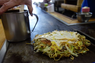 Close-up of preparing food on table