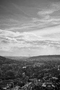 Aerial view of cityscape against sky