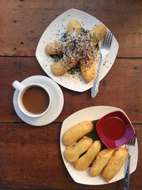 High angle view of breakfast served on table