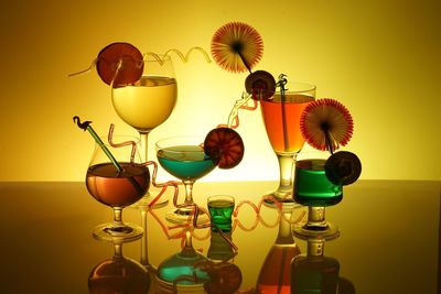 Studio shot of cocktail glasses with twisted straws