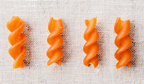 High angle view of orange slices against white background