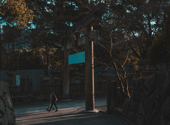 Man walking on street in city