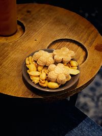 High angle view of fruits in plate on table
