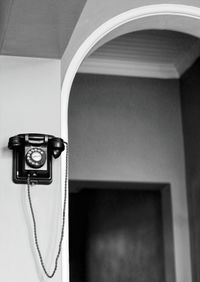 Close-up of camera on wall