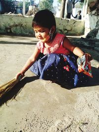 Cute girl playing with umbrella