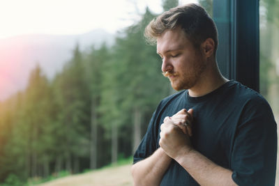 Young man looking away